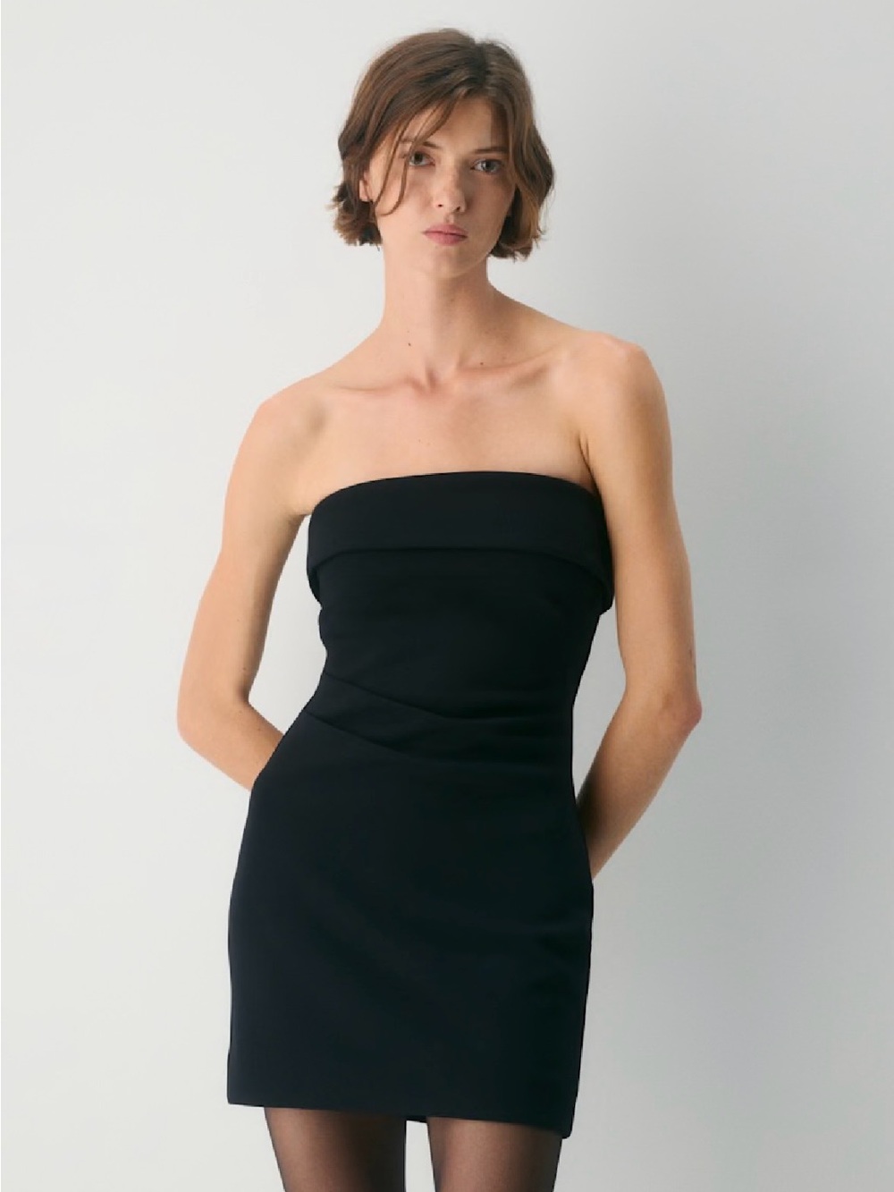 Babaton FigureKnit Eyecatcher Mini
Dress (Aritzia)
